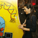 Actress Eva Longoria plays a vintage Pac-Man machine in 2007.
